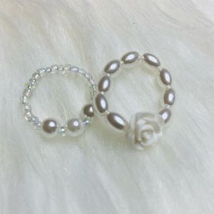 Camellia flower pearl elastic band ring set